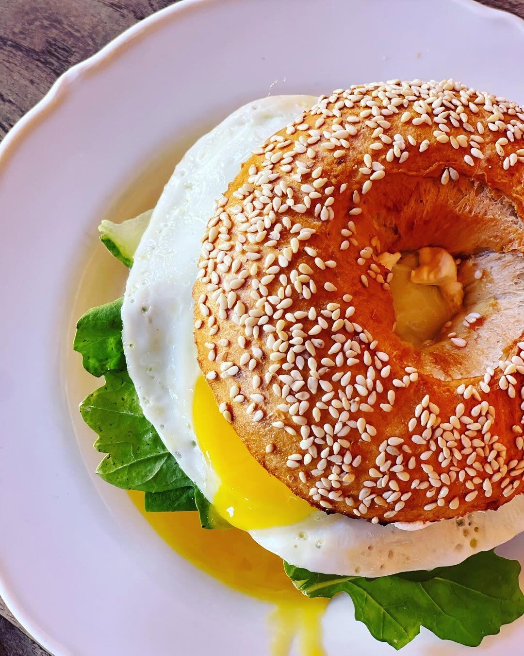 Sesame bagel with a soft-set egg